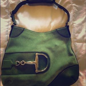 GUCCI Green leather and suede horsebit bag.